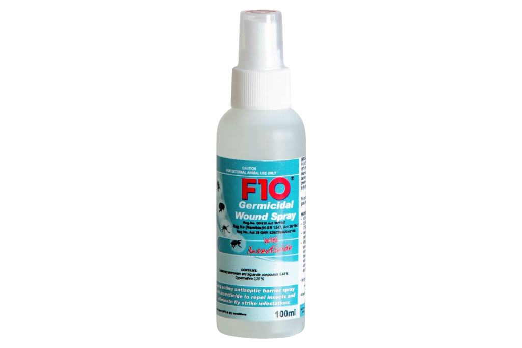 F10 Germicidal Wound Spray with Insecticide in a 100 ml white spray bottle with a turquoise label, designed for cleaning and protecting animal wounds while helping repel insects and prevent fly strike.