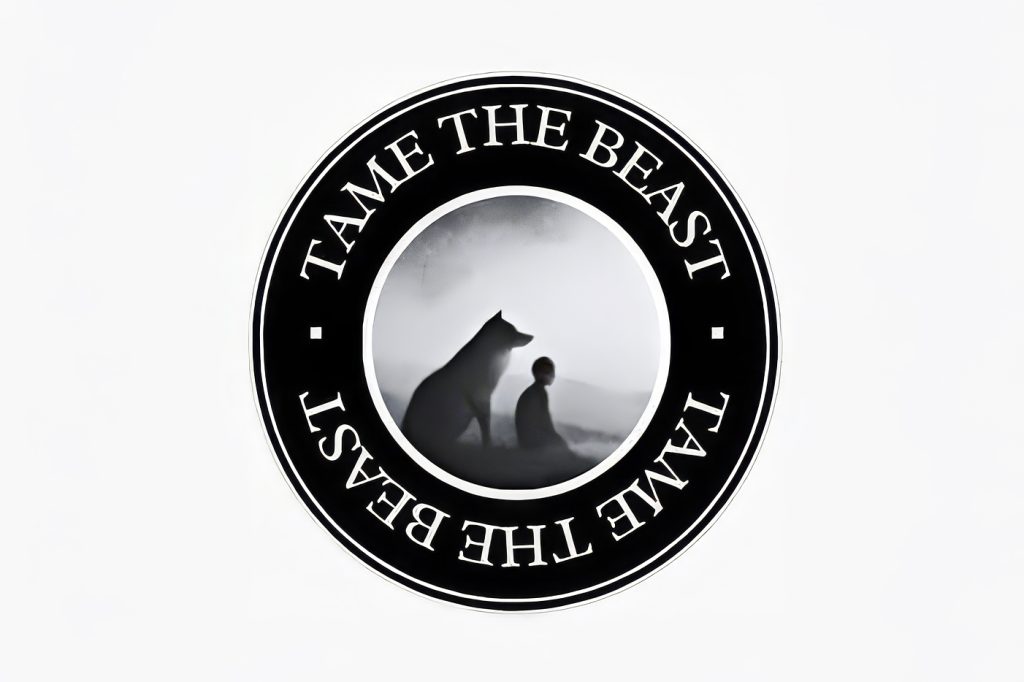 Tame the Beast Dog Training logo featuring a black circular emblem with the words “Tame the Beast” repeated around the border. In the centre is a silhouette of a seated dog beside a person against a soft, misty background, symbolising the bond between dog and handler.